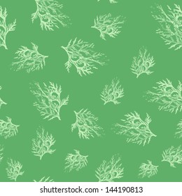 Seamless pattern with branches in pastel colors on a green background