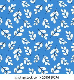 seamless pattern with branches with white leaves. cute vector cartoon blue background.