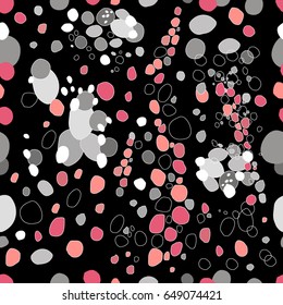Seamless pattern . Bright colored candy on a black background. Pink, white, gray circles and ovals