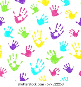 Seamless pattern with bright and colorful family hand-prints on white background. Vector illustration.