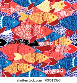 Seamless pattern of bright colorful fish on blue