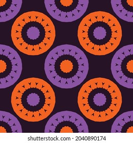 Seamless pattern with bright colorful geometric ornament.