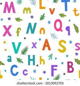 Seamless pattern with bright colorful hand drawn doodle letters and stars for children and baby design and accessories.
