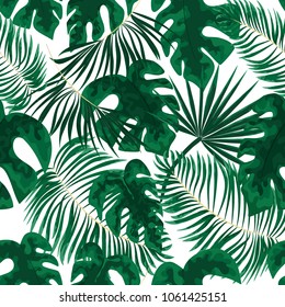seamless pattern of bright green tropical leaves on white background. Tropical palm leaves, jungle leaves seamless vector floral pattern background.