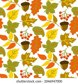 Seamless pattern with bright leaves, acorns and berries on a white background in a flat style. Yellow, orange, red, green and gold colors. Autumn background. Abstract art leaf background vector.