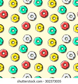 Seamless pattern of bright multi-colored donuts. 