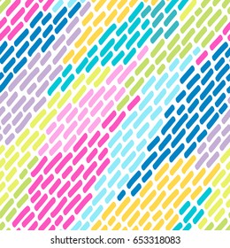 Seamless pattern from bright multi-colored strokes.Vector