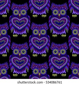 Seamless pattern with bright owls. Cartoon style birds. Tile texture for scrapbook paper, wrapping or web. Vector
