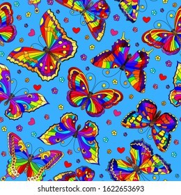 Seamless pattern with bright rainbow butterflies and flowers on blue  background