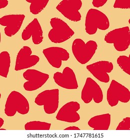 Seamless pattern with bright red hearts on beige background. Vector design for textile, backgrounds, clothes, wrapping paper, web sites and wallpaper. Fashion illustration seamless pattern.