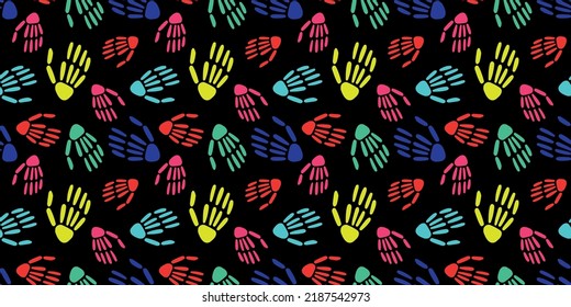  seamless pattern of bright Skeleton hands on a black background. bones pattern. Design for Halloween and day of the Dead