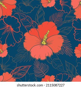 Seamless pattern with bright tropical flowers and leaves on a blue background