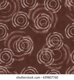 Seamless pattern of brown circles, overlapping each other, made by hand by brush with ink. Vector
