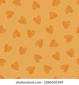 Seamless pattern with brown hearts