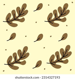 Seamless pattern of brown leaves on a yellow background