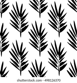 Seamless pattern with brush painted palm leaves. Hand drawn abstract background.