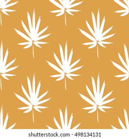 Seamless pattern with brush painted palm leaves. Hand drawn abstract background.