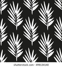 Seamless pattern with brush painted palm leaves. Hand drawn abstract background.