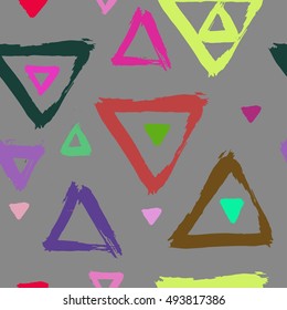 Seamless pattern with brush painted triangles. Hand drawn abstract background.