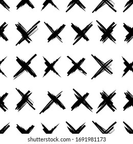 seamless pattern of brush strokes crosses located diagonally on a white background. Monialistic black and white pattern in the Scandinavian style for fabric, paper, wallpaper, lining.