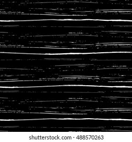 Seamless pattern of brush strokes. Grungy seamless texture. Vector illustration.