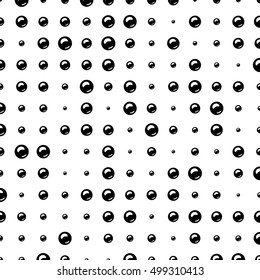 Seamless pattern of the bubbles. Monochrome image. Shiny black pearls.
