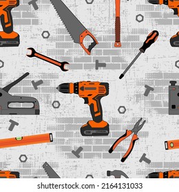 seamless pattern with building tools on bricks and grunge texture.