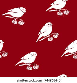 Seamless Pattern with a Bullfinch, Bullfinch Sitting on a Branch with Bunches of Rowan on a Red Background, Christmas Decorations, Vector Illustration