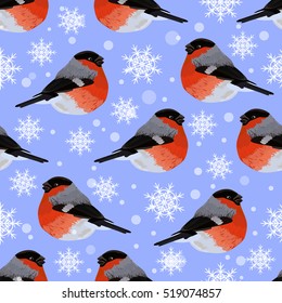 Seamless pattern with bullfinches and snowflakes. Vector illustration on blue background.
