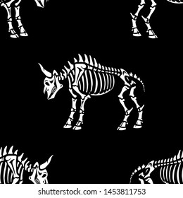 Seamless pattern. Bull's skeleton. Illustration for Halloween. Black background. Great for greeting cards, invitations, for printing on T-shirts and more.