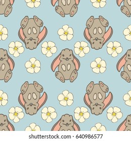 Seamless pattern with bunny and flowers  on blue background