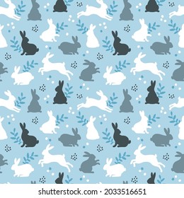 Seamless Pattern with bunny rabbits, dots and floral element on blue background. Vector illustration. Happy Easter egg hunt texture