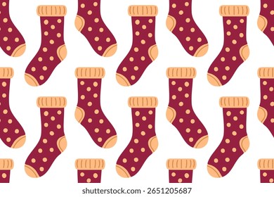Seamless pattern with burgundy socks and polka dots. Soft and warm design for textile and cozy fall illustrations.