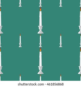 Seamless pattern of burning candles. Vector EPS 10.