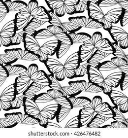 Seamless pattern with butterflies in black and white colors. Vector illustration
