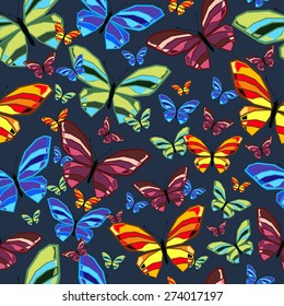 Seamless pattern of butterflies. Colored vector illustration.