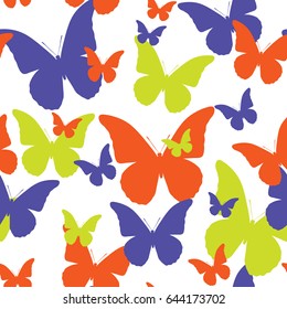 Seamless pattern of butterflies of different color. Vector picture of moths.