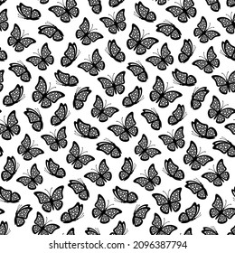 Seamless pattern of butterflies with dotted wings isolated on a white background. Butterfly seamless pattern is great for print gift paper, wedding greeting cards and fabrics