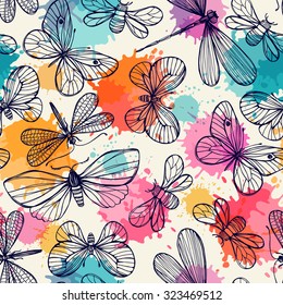 Seamless pattern with butterflies and dragonflies. Freehand drawing