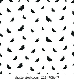 Seamless pattern with butterflies silhouettes.