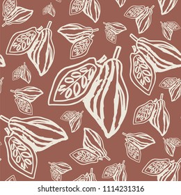 Seamless pattern with cacao fruits on brown background