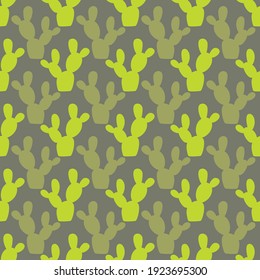 Seamless pattern of cacti in green colors in abstract style