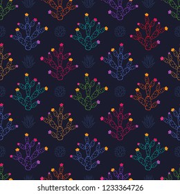 Seamless pattern with cactuses in blue, lilac, red, orange, turquoise and green colors with multicolored flowers and blue succulents on dark blue background