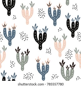 Seamless pattern with cactuses and hand drawn textures.Perfect for fabric,textile.Vector background