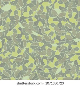 Seamless pattern. Camouflage covered with a grid. Multi-colored texture. Chaos from the spots. Easy to edit.