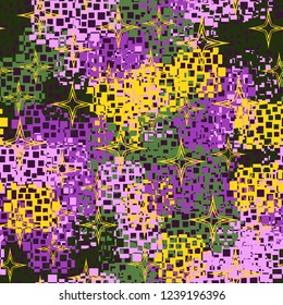 Seamless pattern in camouflage style. The colors of the spring landscape. A scattering of four-pointed stars.