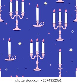 Seamless pattern with candles in chandeliers on a blue background. Vector graphics.