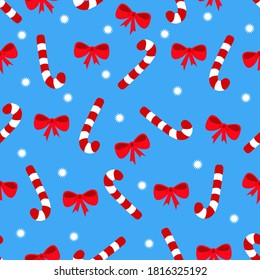 Seamless pattern with candy cane and bow-knot. Vector illustration.