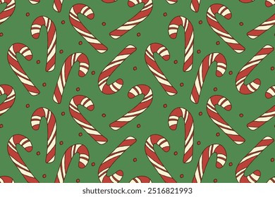 Seamless pattern with candy cane and red dots on a green background. Cute holiday design. Hand drawn sweets with rough outline.