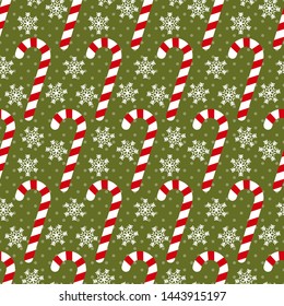 Seamless pattern with candy canes and snowflakes, Christmas vector illustration